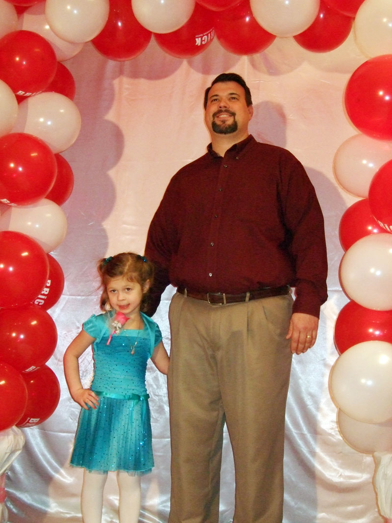 photo of a dad and daughter